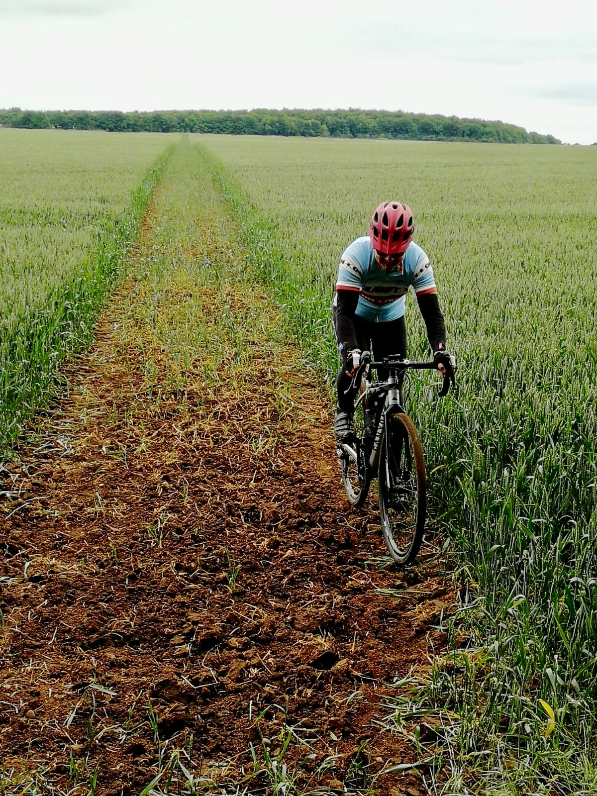 Philip Heath riding a bike- Counsellor in East Midlands & Online