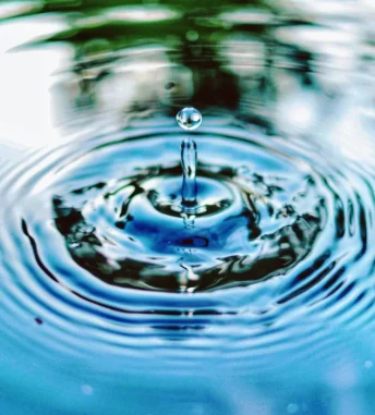 jimmy-chang-NP8gd2KUnfw-unsplash Water rippling from droplet